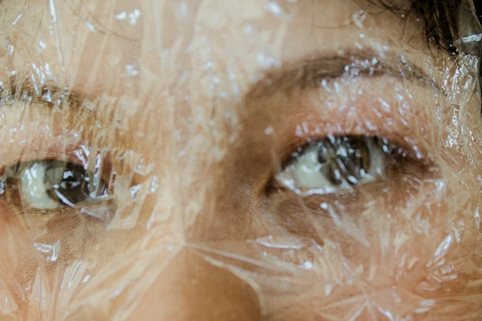 Woman with clear, healthy acne-prone skin using Ayurvedic skincare